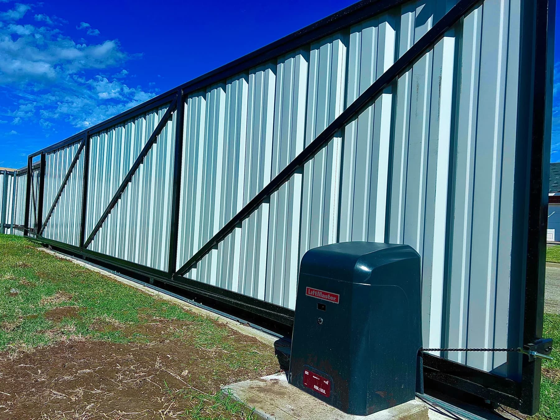 Metal entrance gate with a LiftMaster operator
