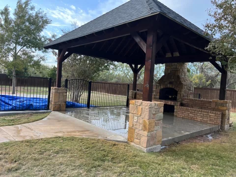 Covered outdoor pavilion beside a pool